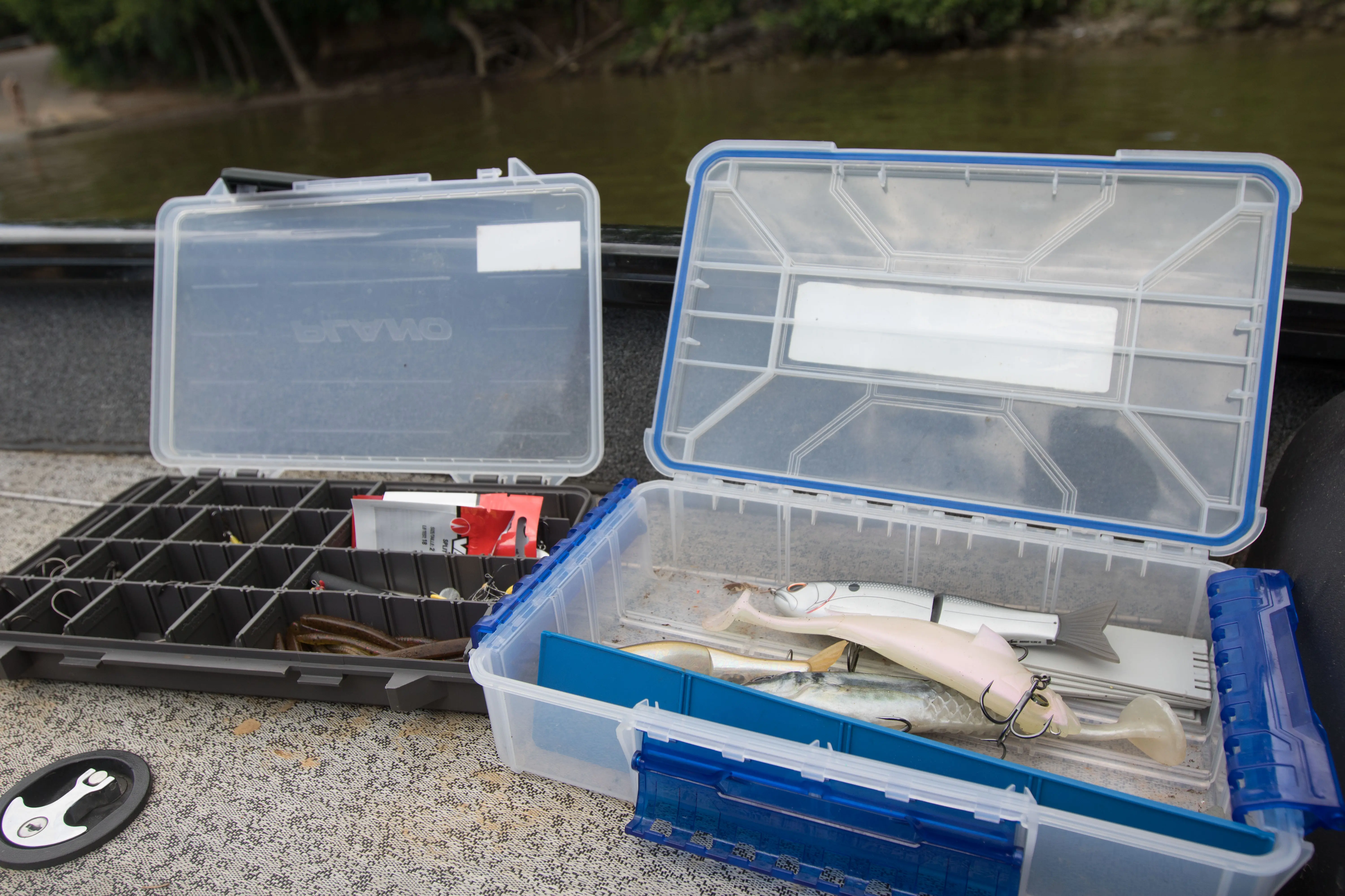 A tackle box with a waterproof seal and a box without a waterproof seal side by side