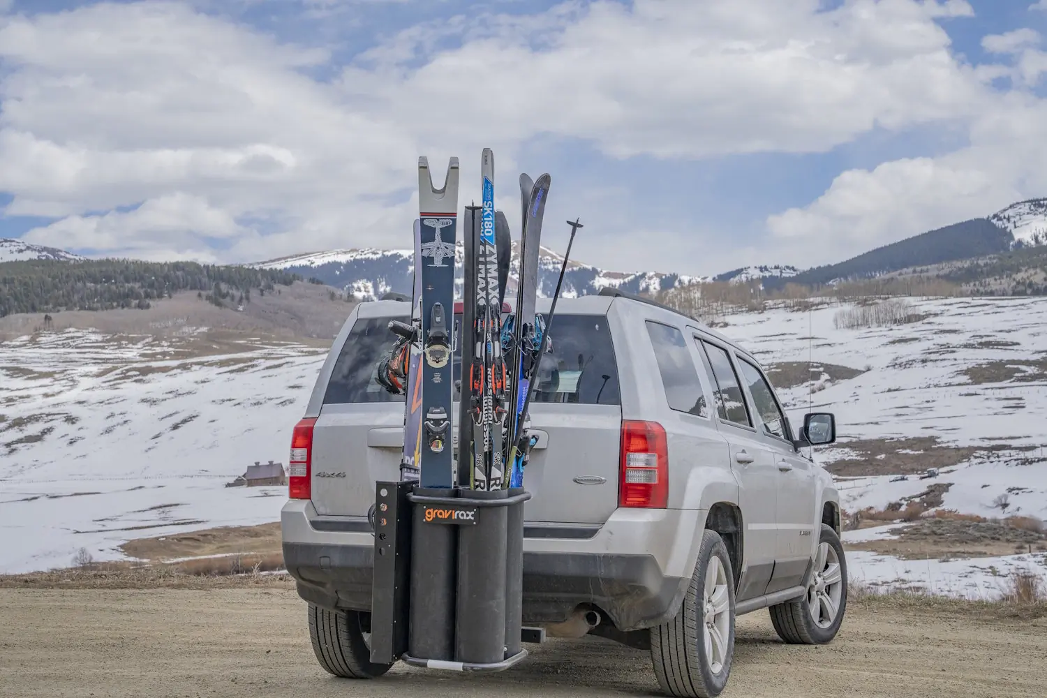 Gravirax GR-4 Ski Rack attached to car carrying skis and snowboard.