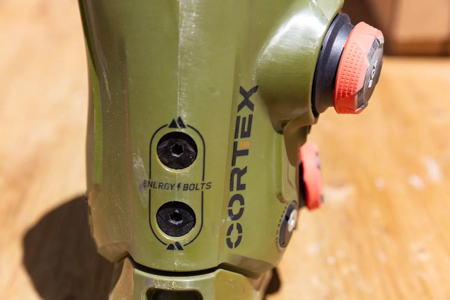 Back view of the K2 Cortex 130 ski boot displaying two energy bolts