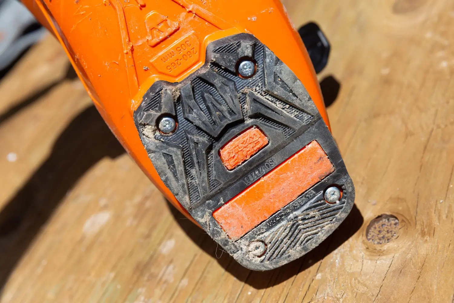 Close-up of the Tecnica Mach1 Men’s LV 130 ski boot sole and grip.