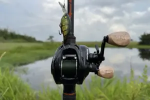 A person holding KastKing Megatron 200 Baitcasting Reel