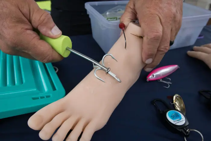 The DHUKR tool removing a hook from a fake foot
