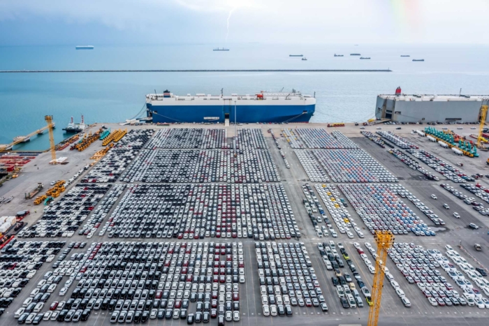 roll-on roll-off ship in port with auto imports