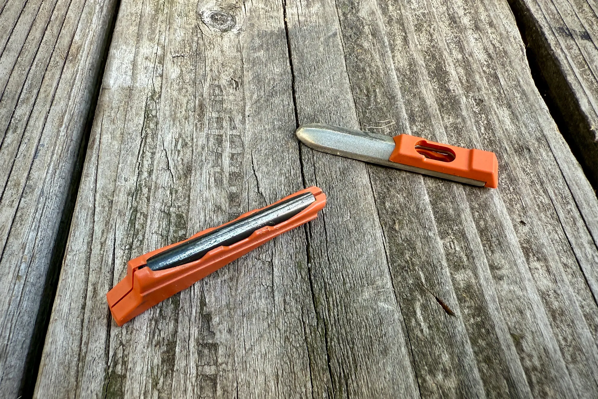 Firestarter and sharpener from the Leatherman Signal shown separately