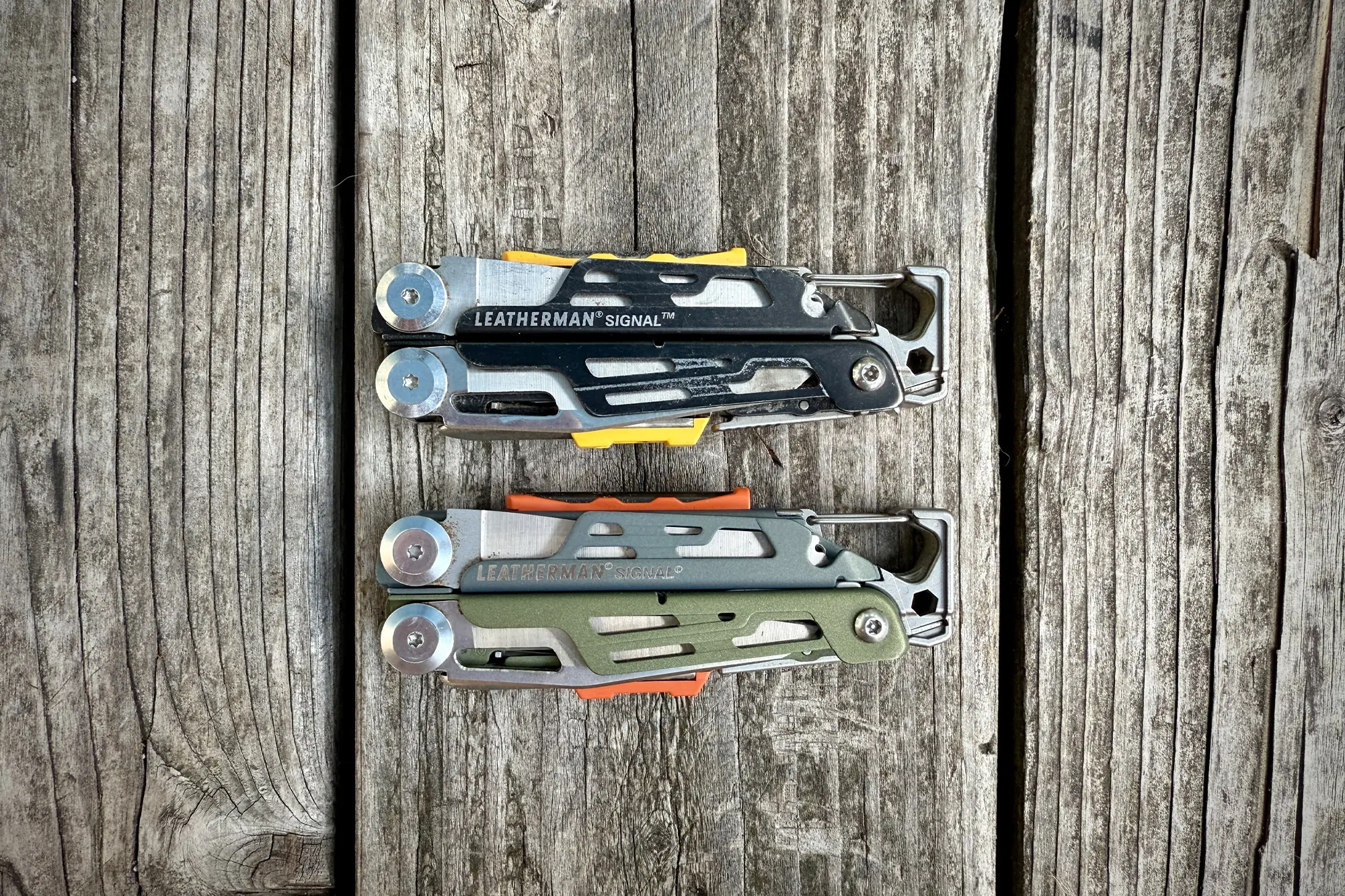 Two versions of the Leatherman Signal folded side by side