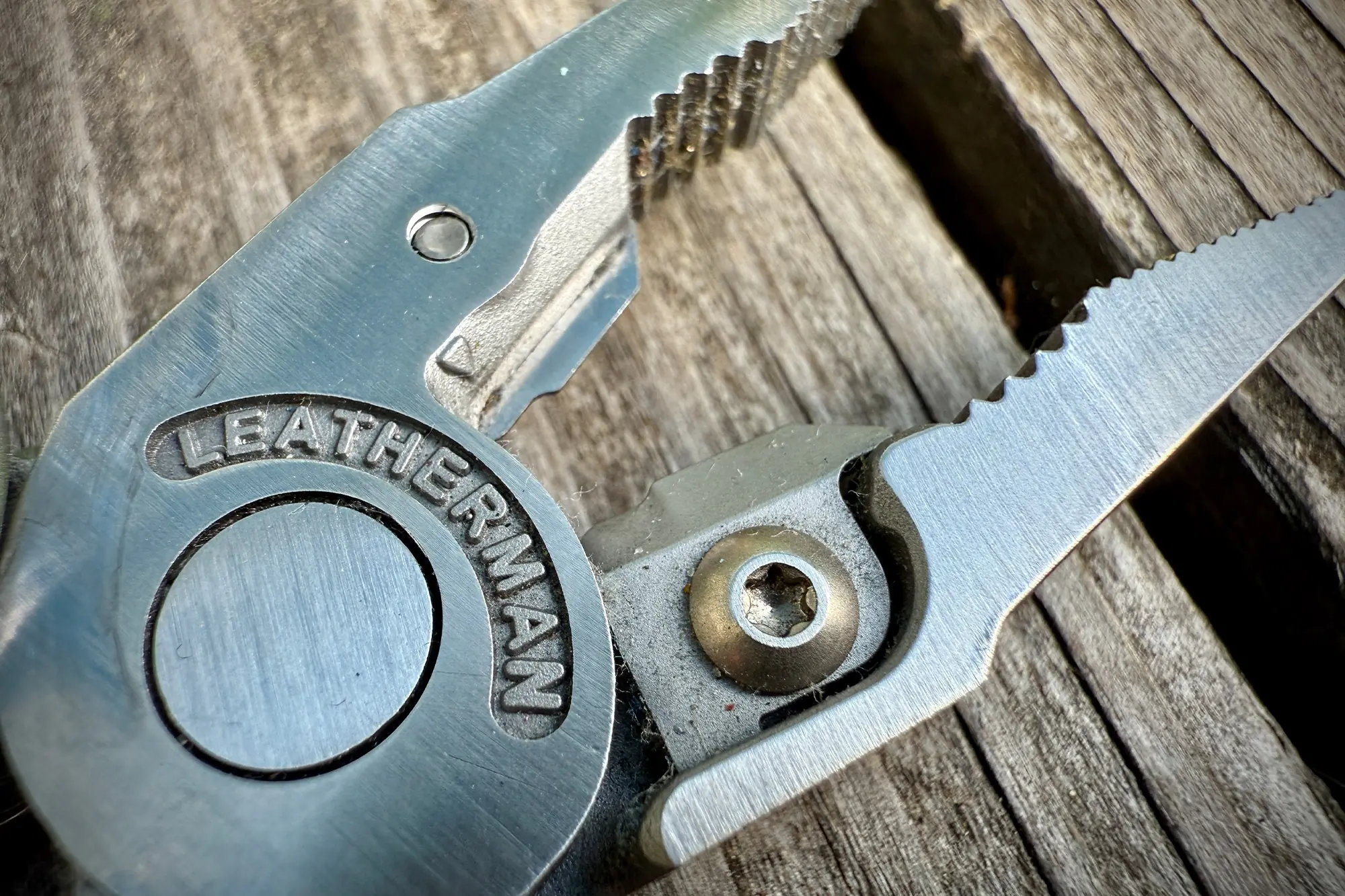 Close-up of Leatherman Signal plier teeth and logo