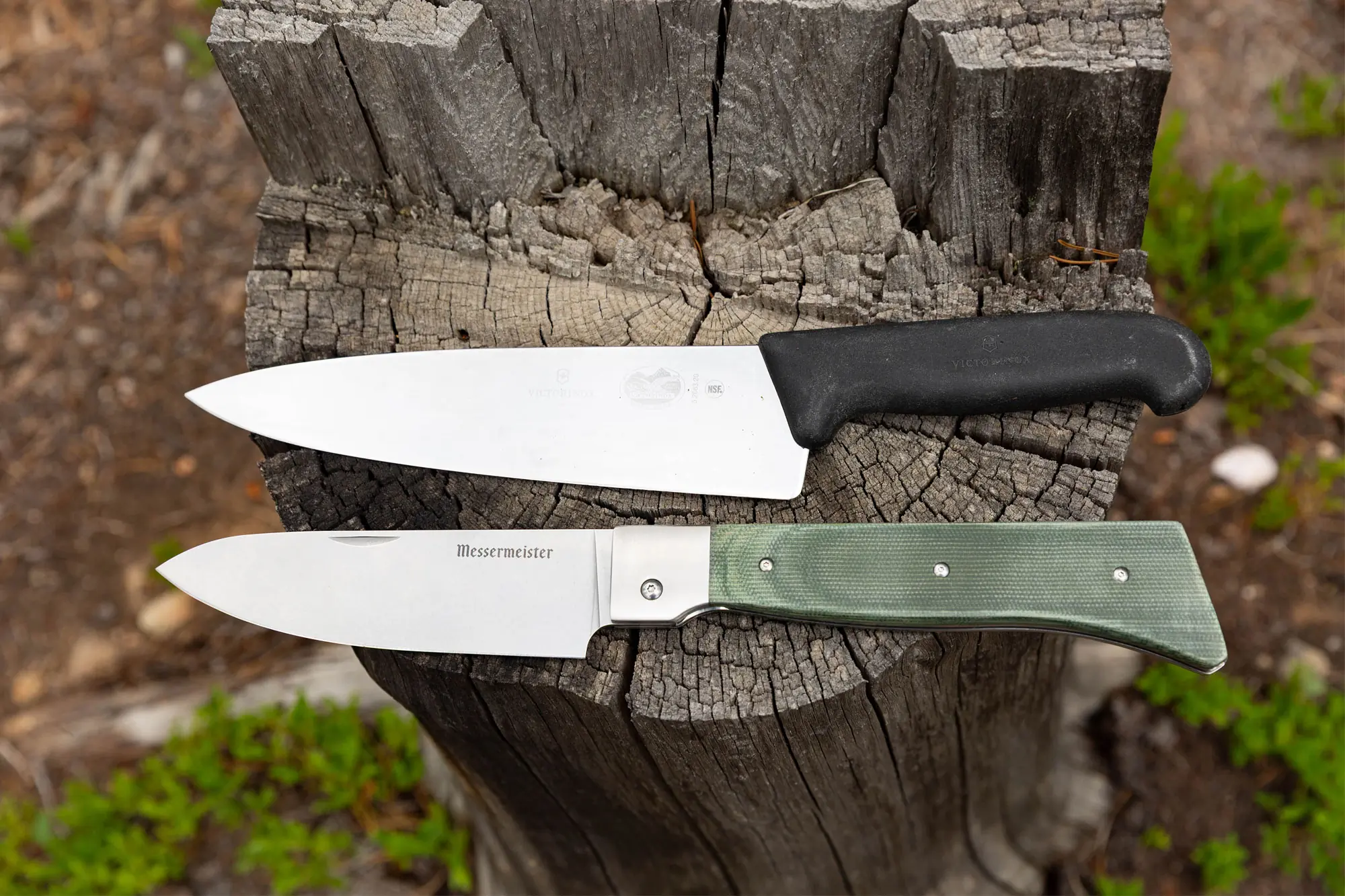 Messermeister Adventure Chef Knife on a wooden stump