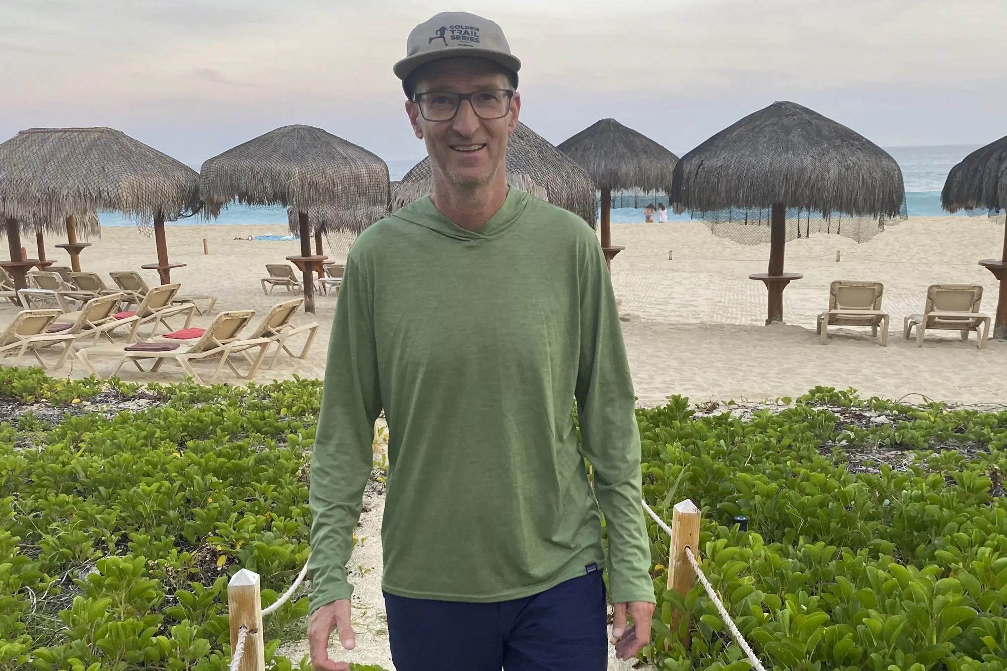 wearing Patagonia Capilene Cool Daily Hoody at the beach