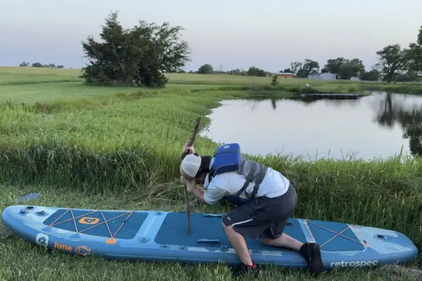 a person with Retrospec-June SUP