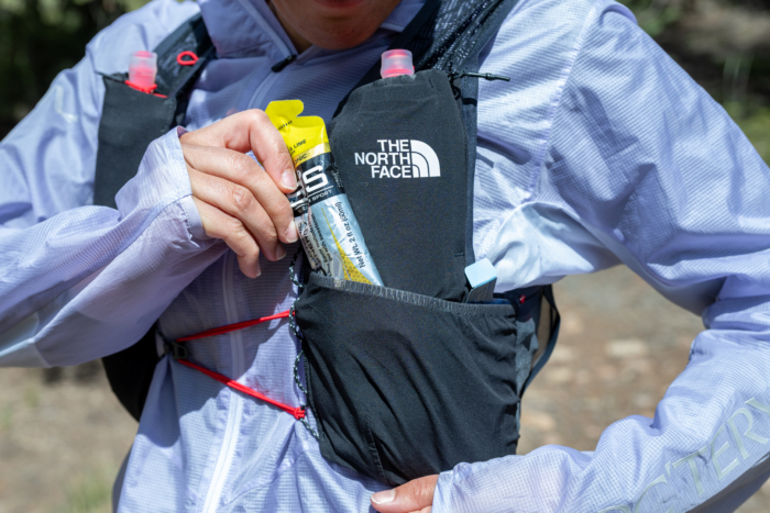 A woman wearing the North Face run vest