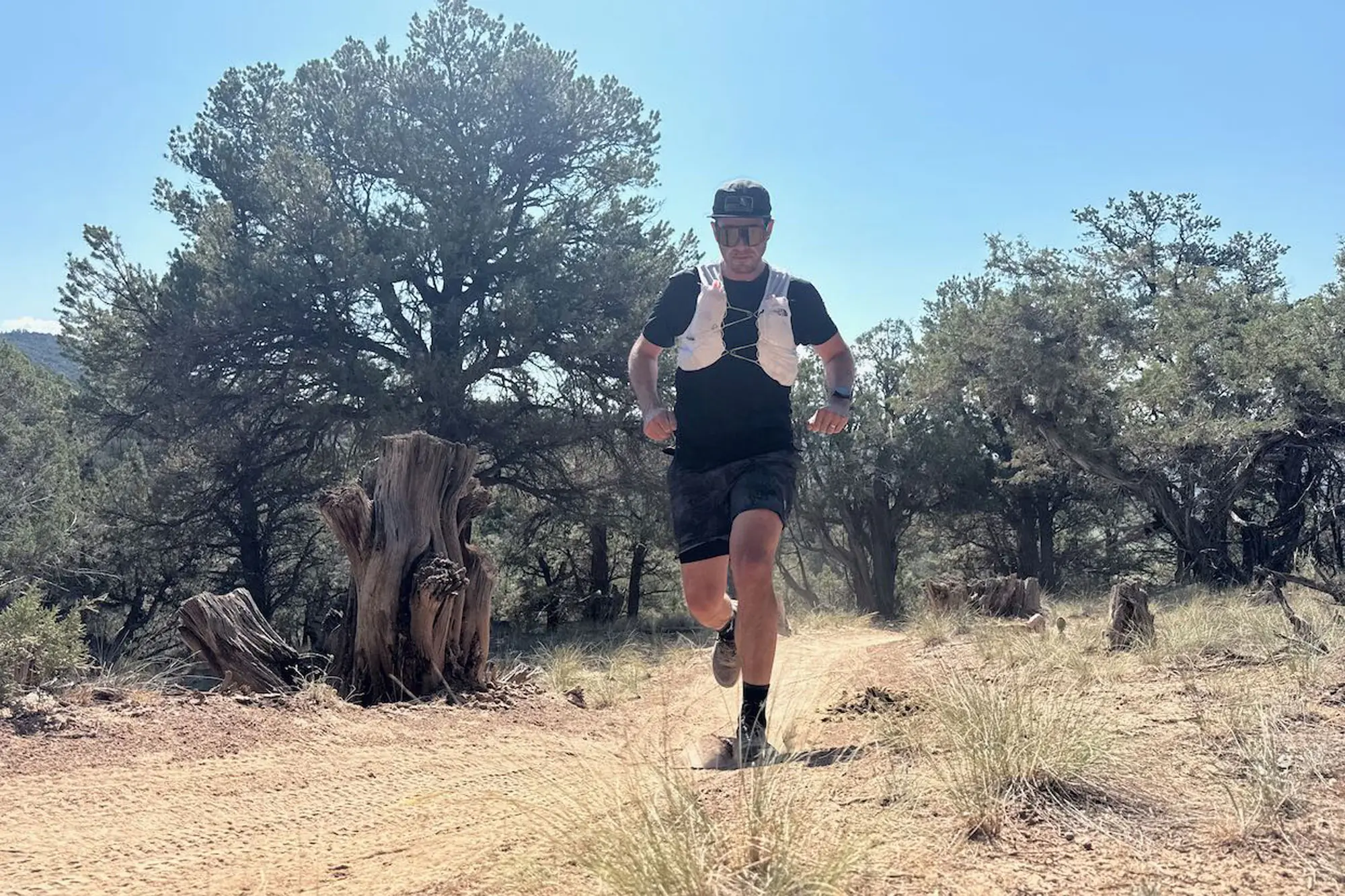 a runner outdoors with a The North Face Summit Series Run Vest 5