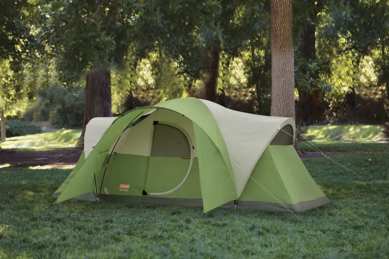 Close up of a person loading a supplemental oxygen container into a blue backpack