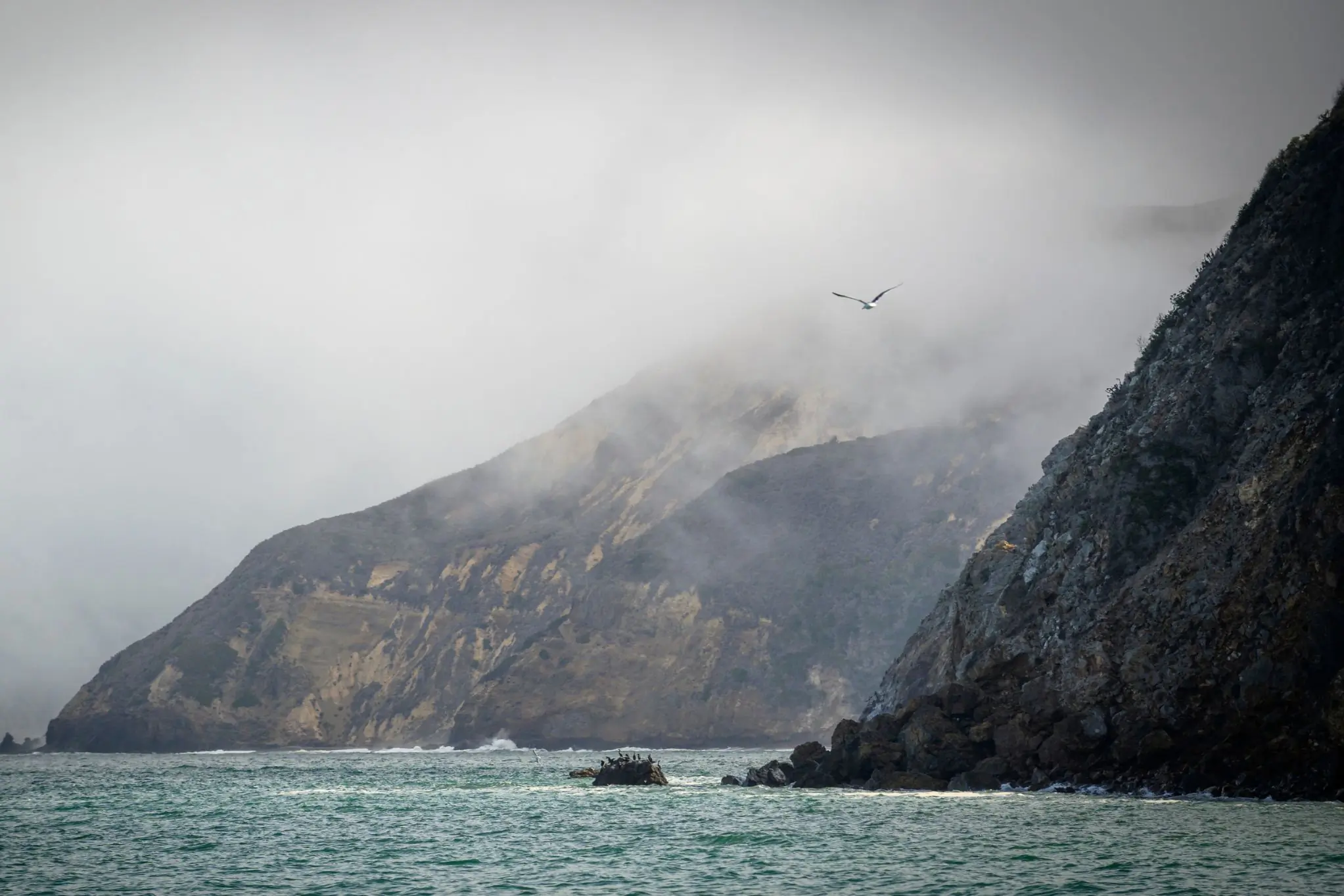 View of the coastline of Channel Islands with oceans and fog