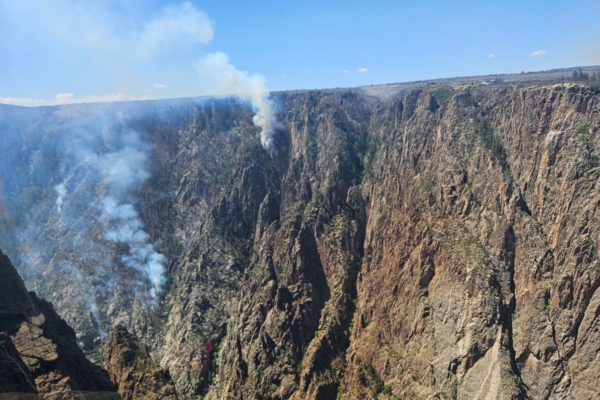 Rocky canyon walls with smoke
