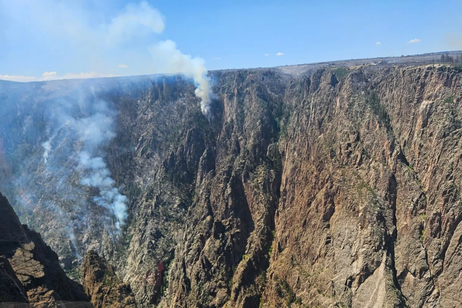 Rocky canyon walls with smoke