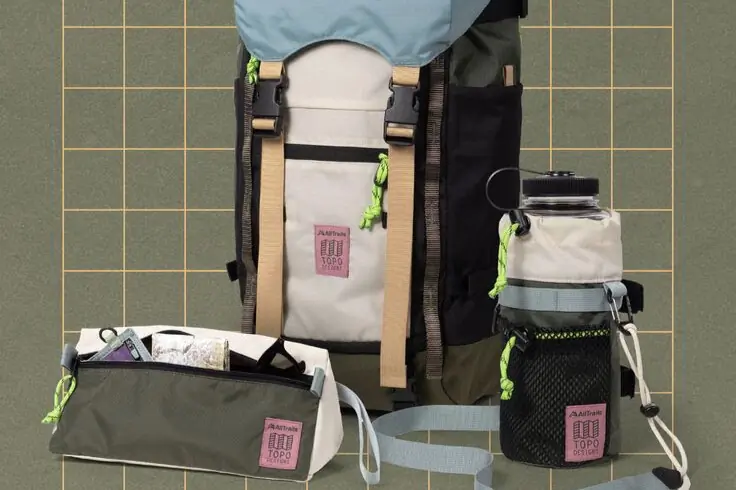 Backpack in middle, water bottle holder on right, small bag on left against checkered green background