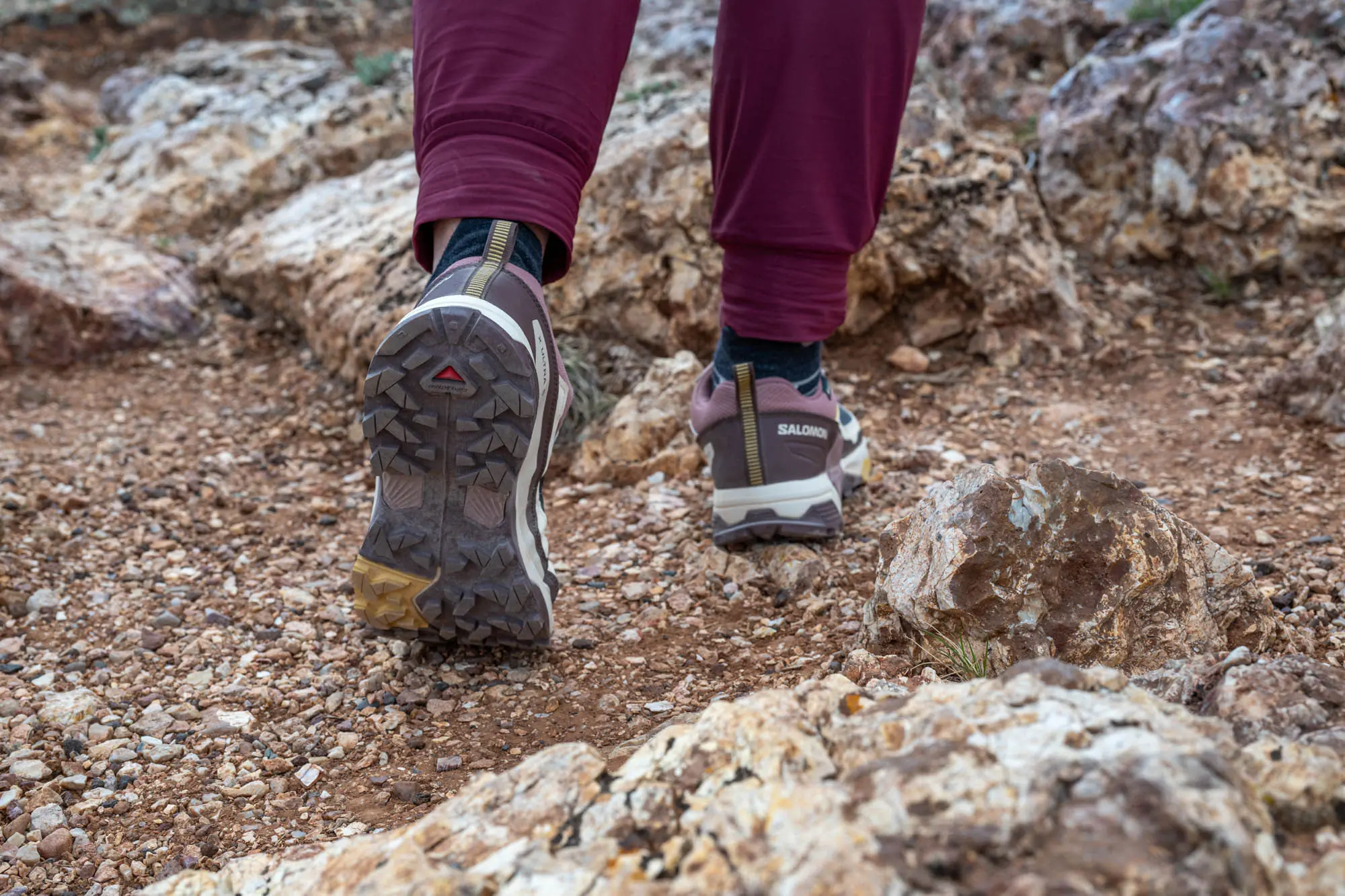 wearing the X Ultra 5 GTX on a rocky terrain