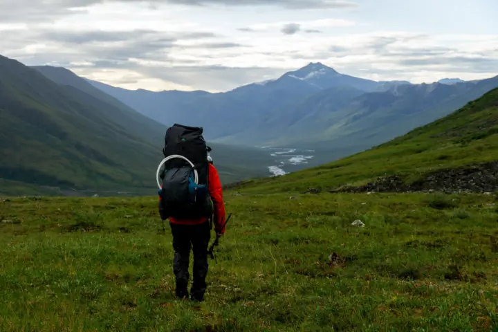 the author heads down to another arctic river, wearing the unaweep pack