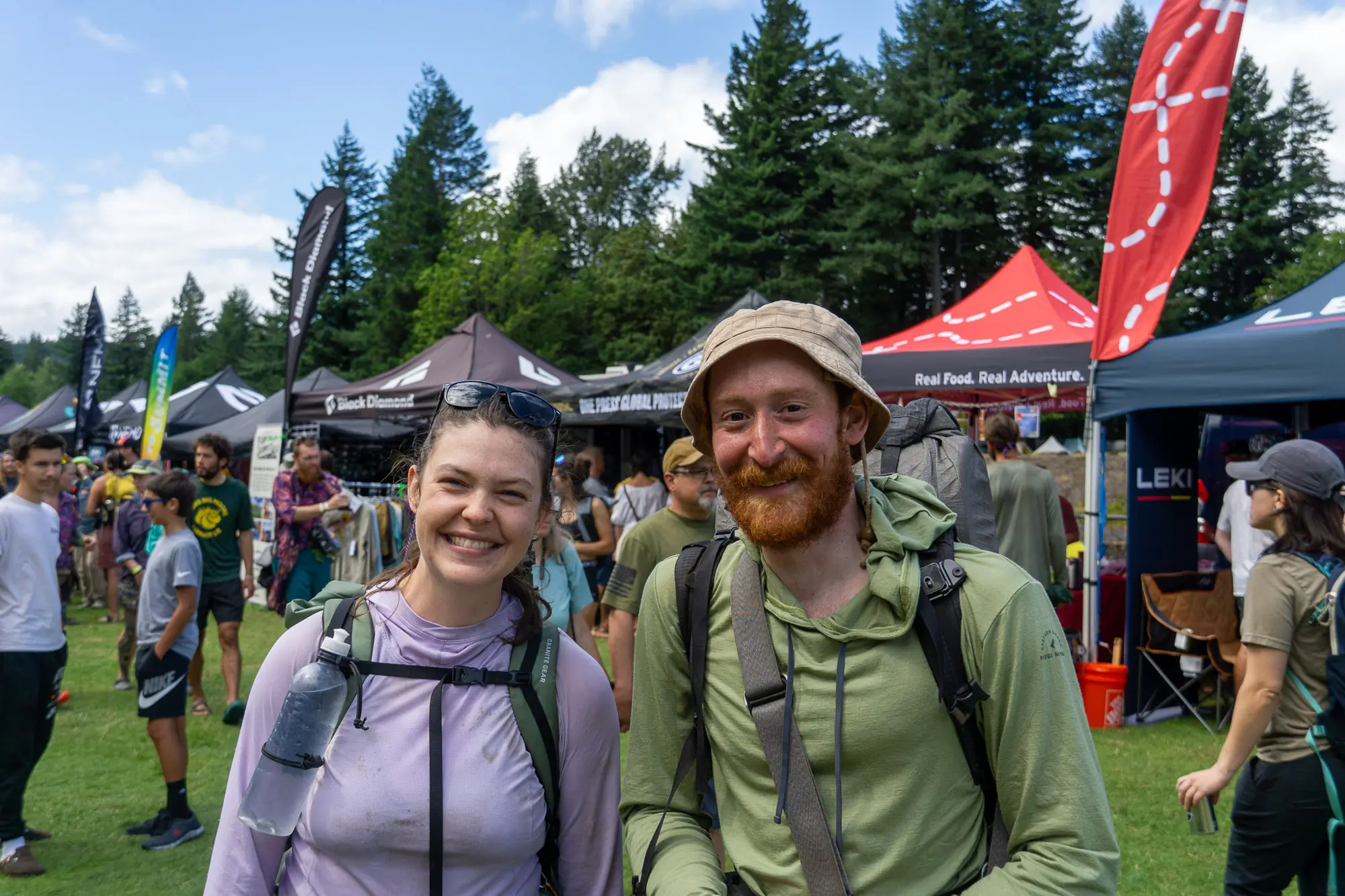 pct thru hikers toucan and matt pose at pct days 2025