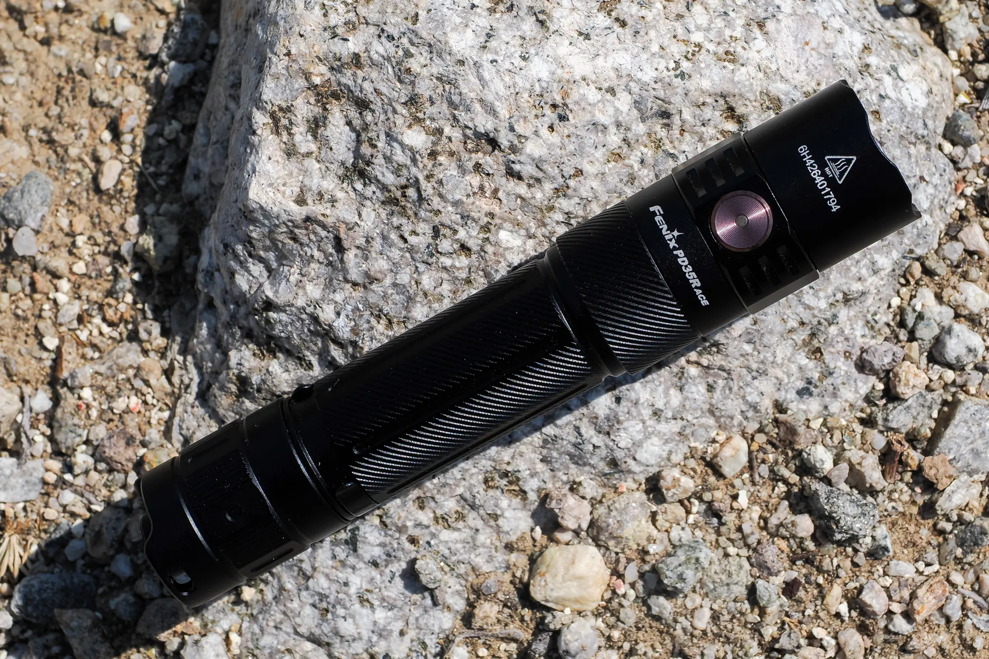 Fenix PD35R ACE on a rock