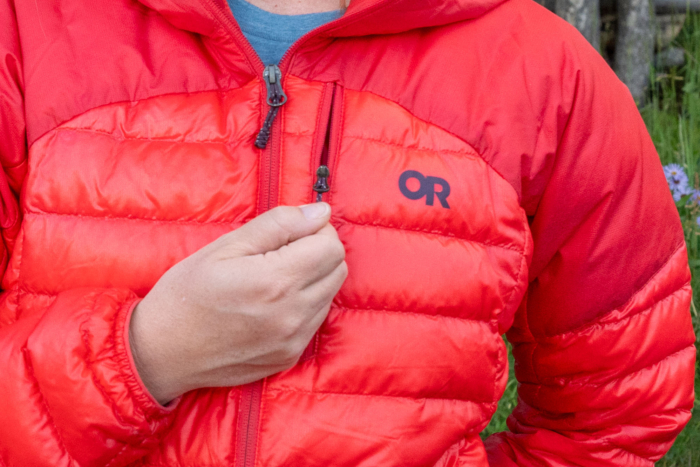 zipping up Outdoor Research Helium Down Hoodie