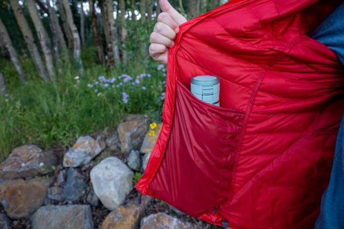 Outdoor Research Helium Down Hoodie with water bottle
