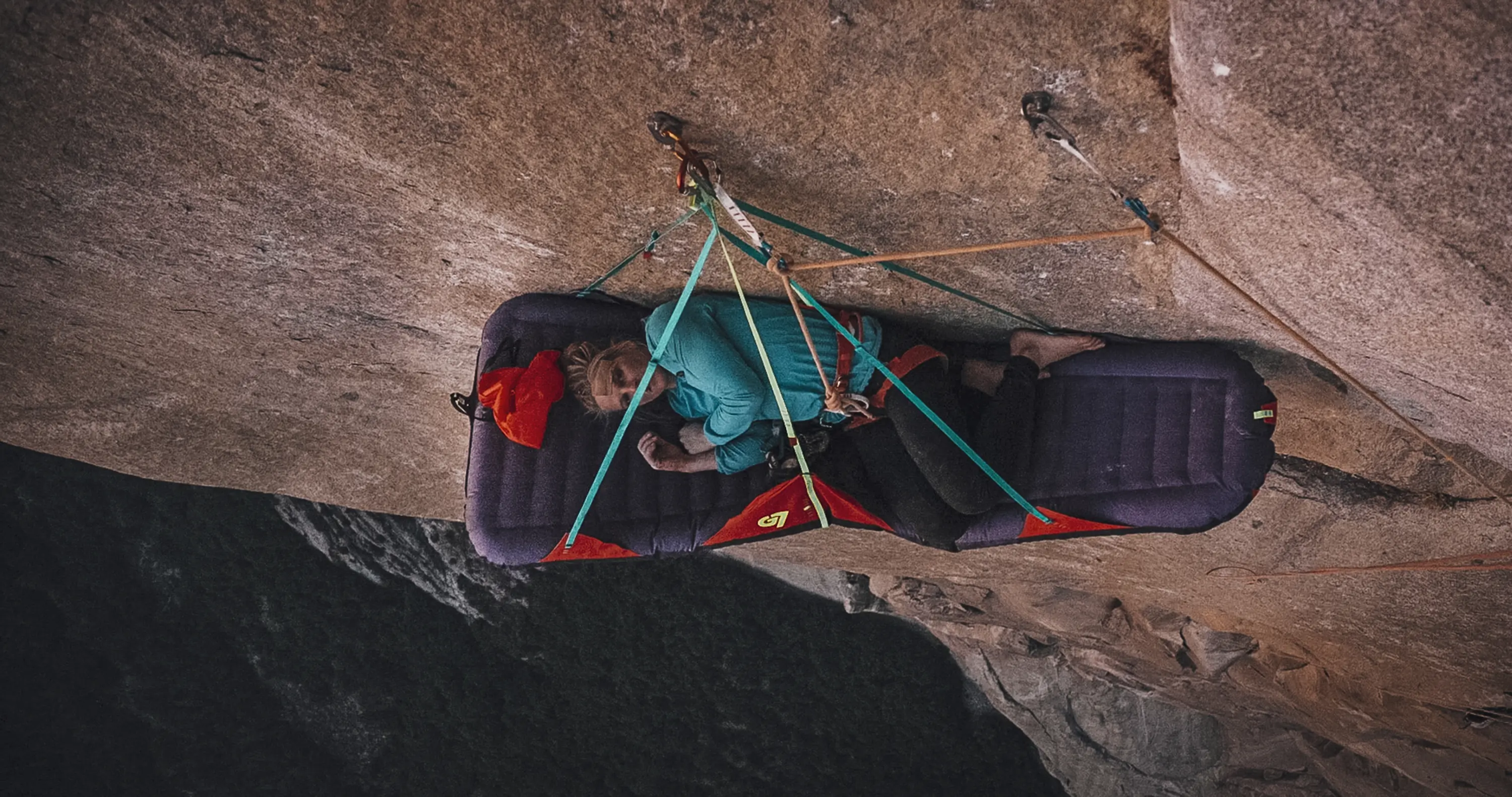 Emily Harrington rests on a sleeping pad on El Cap