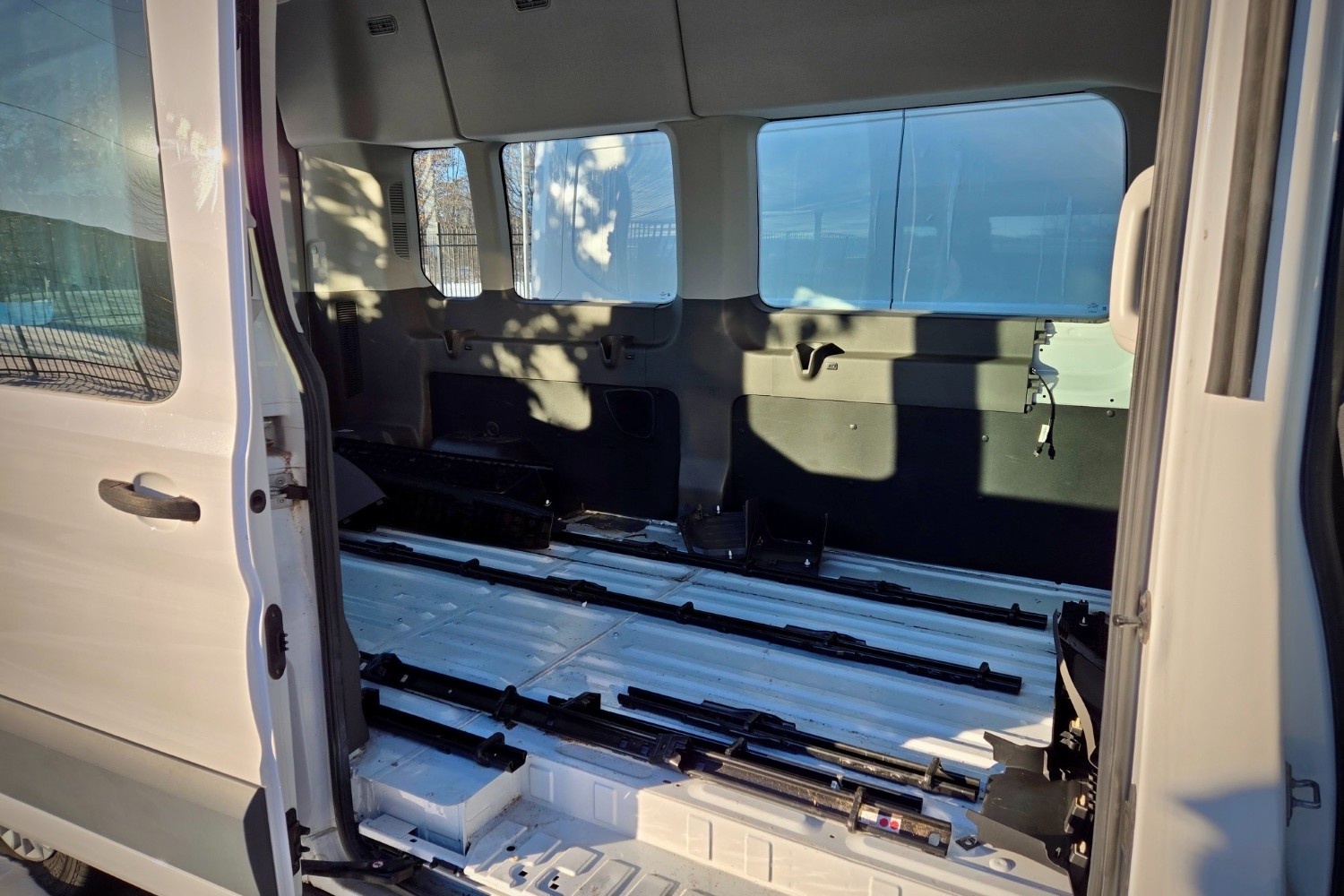 Interior of a Ford Transit Passenger van with seats removed
