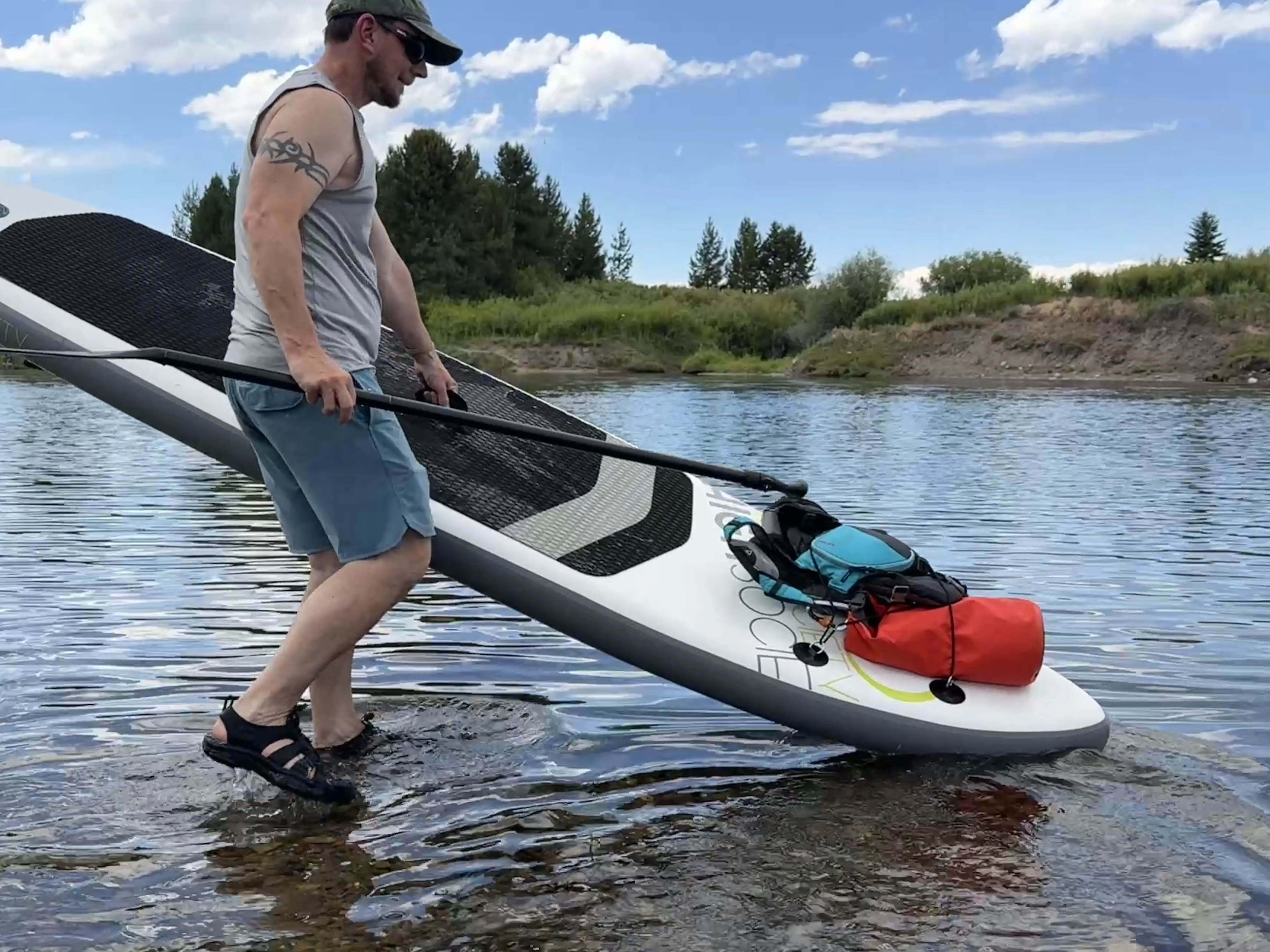 a man wearing KEEN Newport H2 sandals