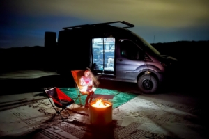 Ford Transit campervan on a beach