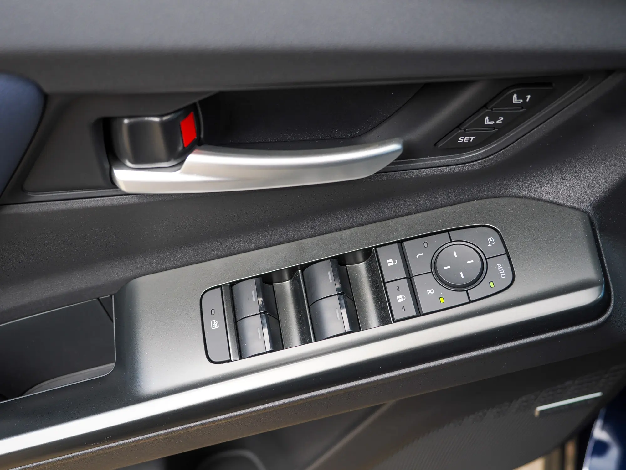 2026 Subaru Solterra driver's door handle and controls