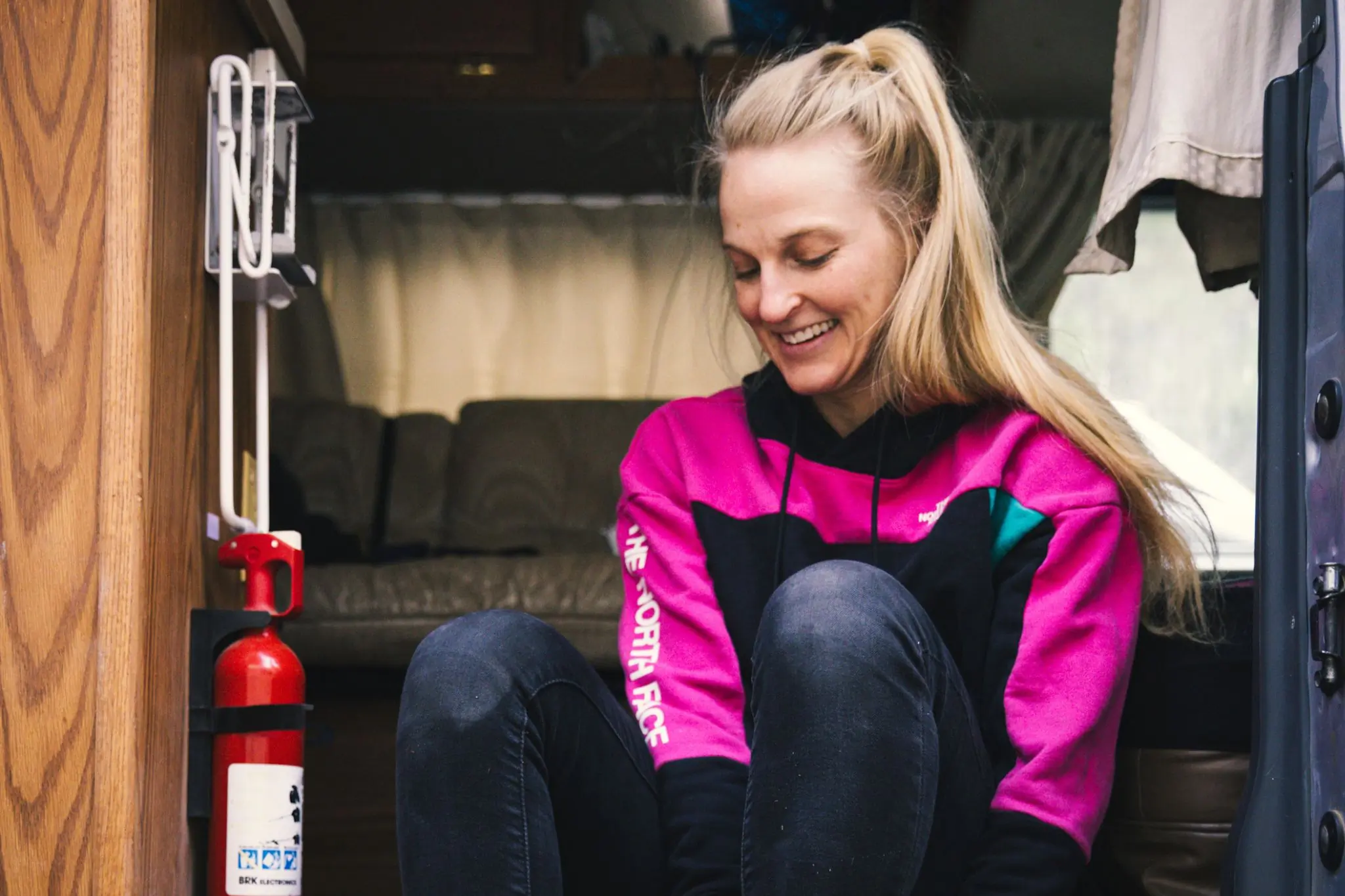 Close up of Emily Harrington sitting in a van