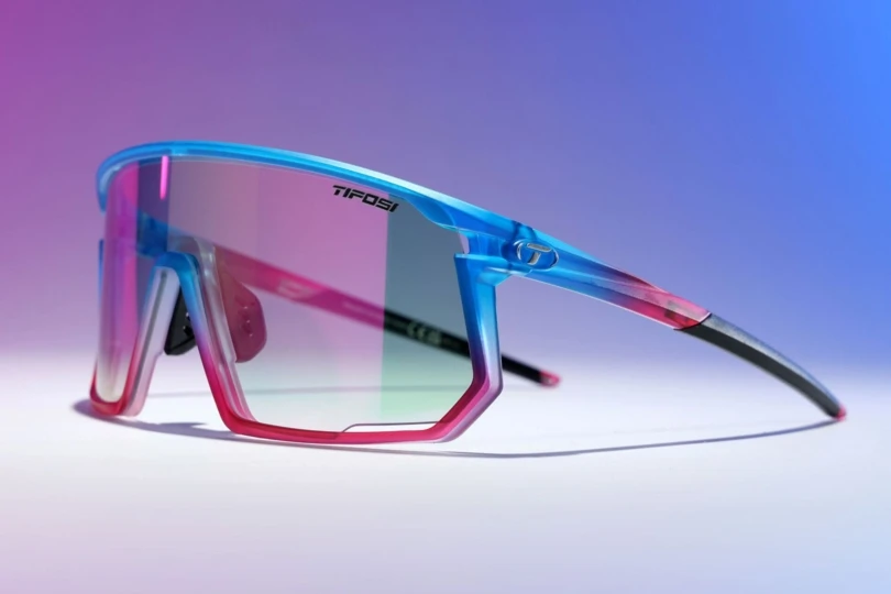 Close-up shot of pink and blue cycling sunglasses