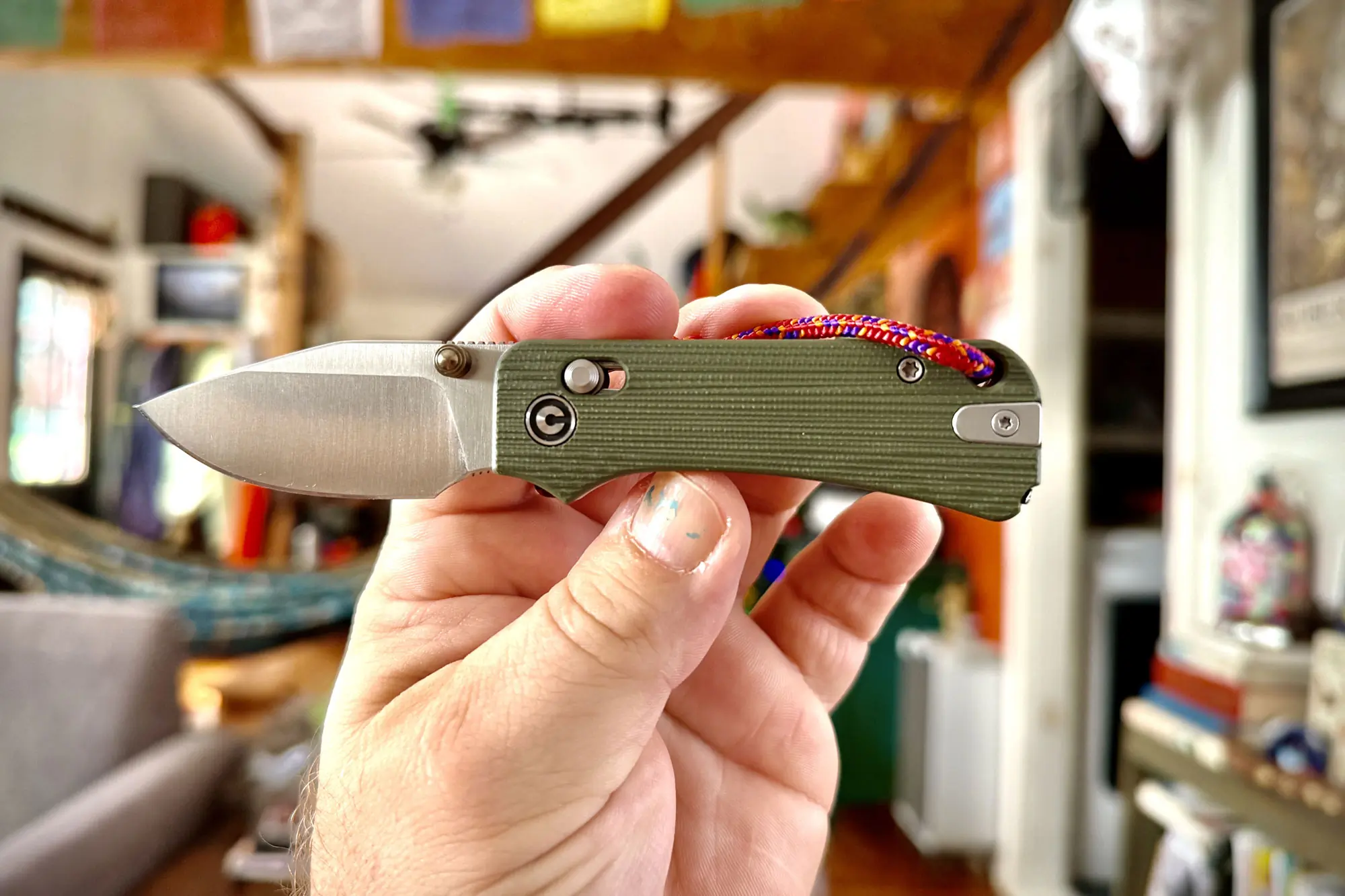 CIVIVI Baby Banter 2 TG  in a hand