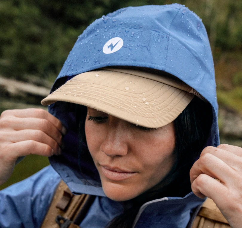 woman wearing marmot rain shell hood