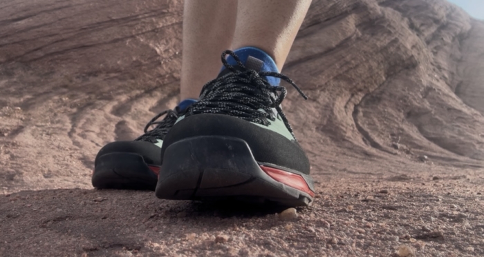 Front view of Black Diamond Technician Pro Approach Shoe on red rock surface