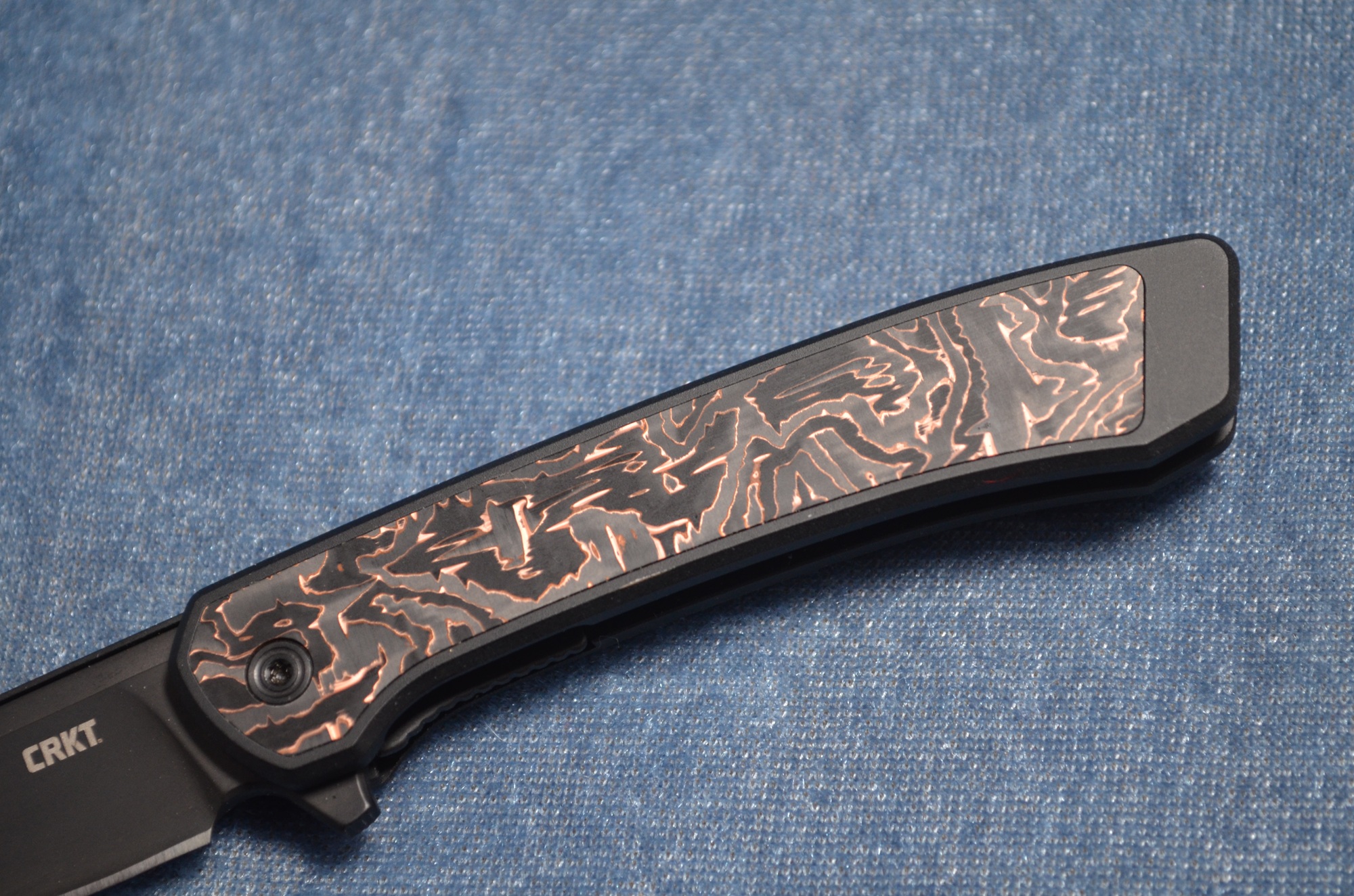 CRKT Q Compact Liner Lock handle with copper patterned inlay