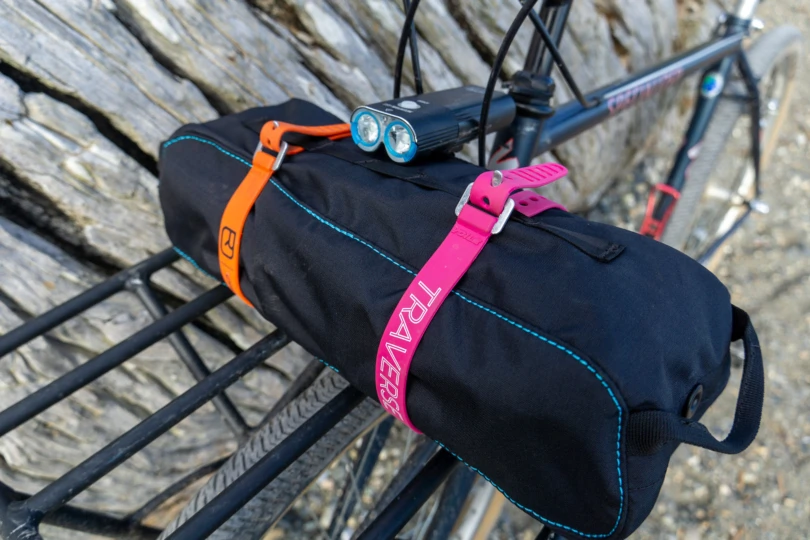 the chair one (re) packed into its storage case and strapped down to mount on a bike