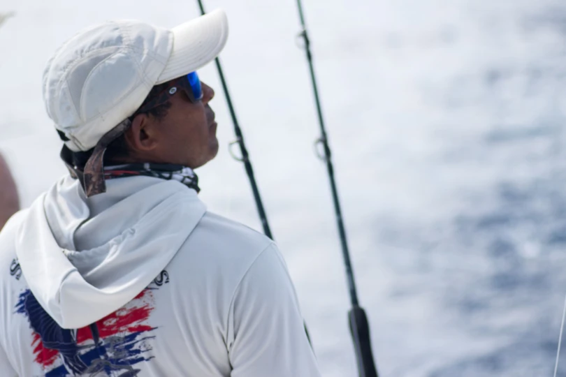 A Costa Rica fishing Guide overlooks the ocean.