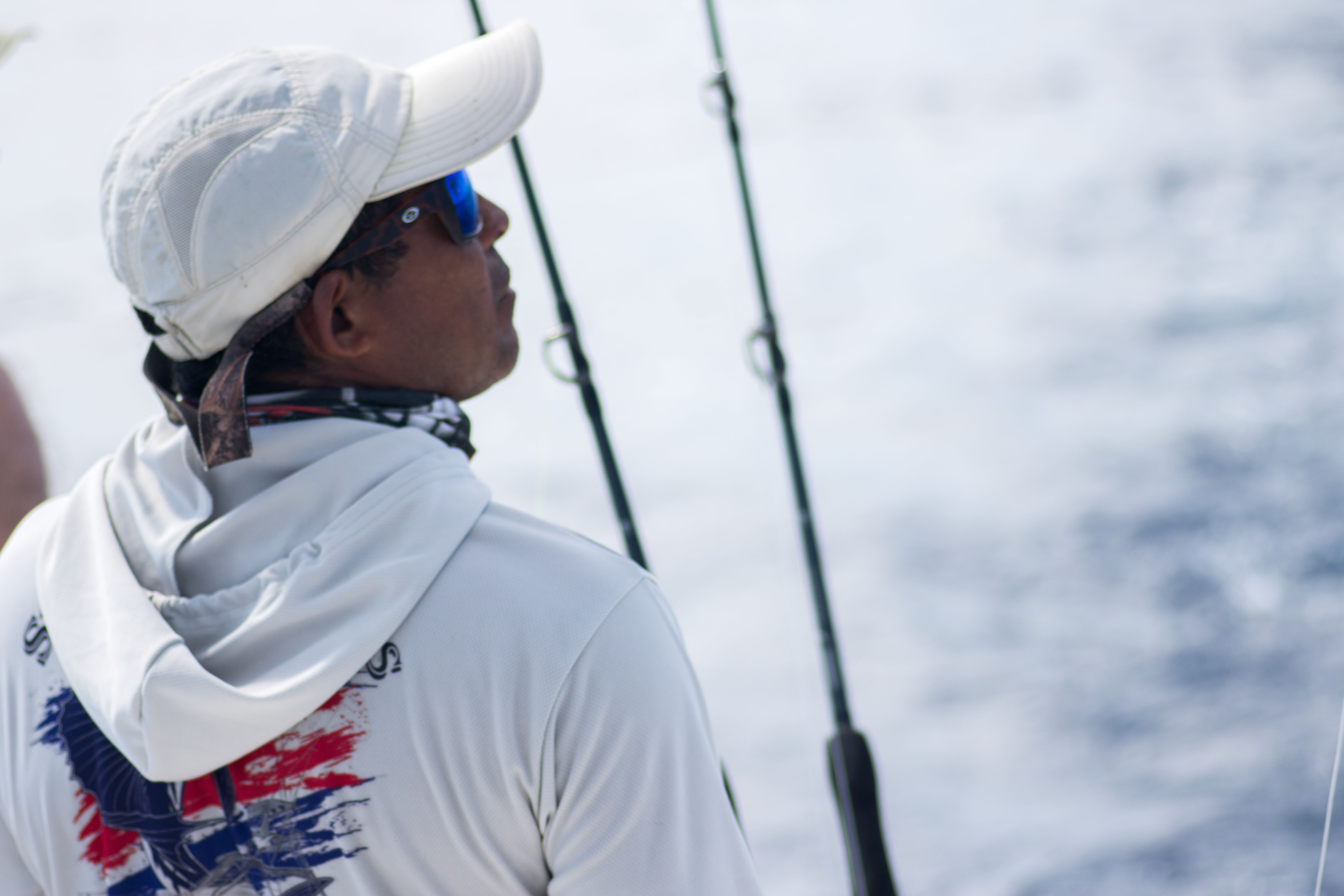 A Costa Rica fishing Guide overlooks the ocean.