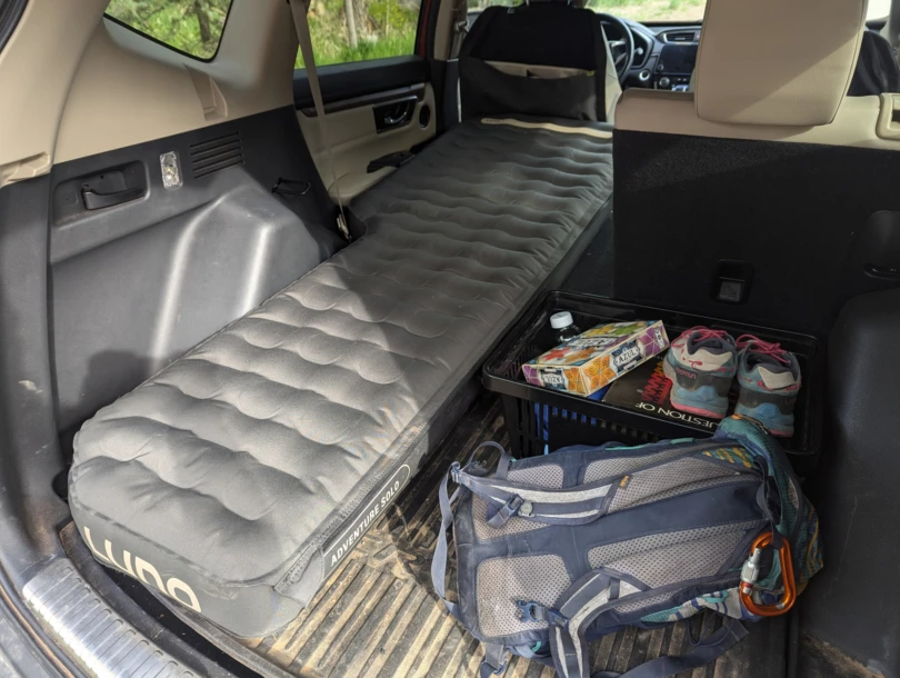 the interior of the author's test vehicle, showing half of the AIR Pro pad being used in solo mode