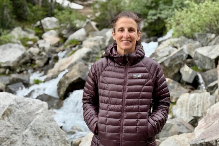 Mountain Hardwear Ghost Whisperer Hoody worn outdoors by a stream