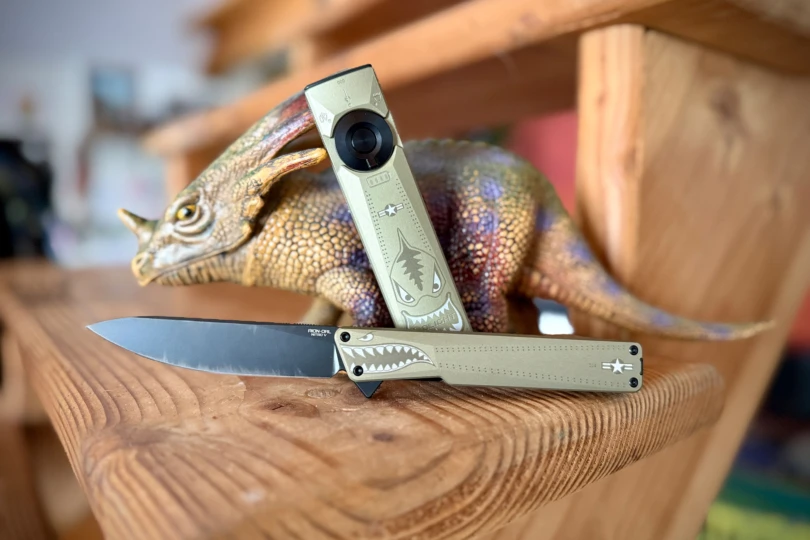 OKNIFE AION with matching flashlight and toy dinosaur