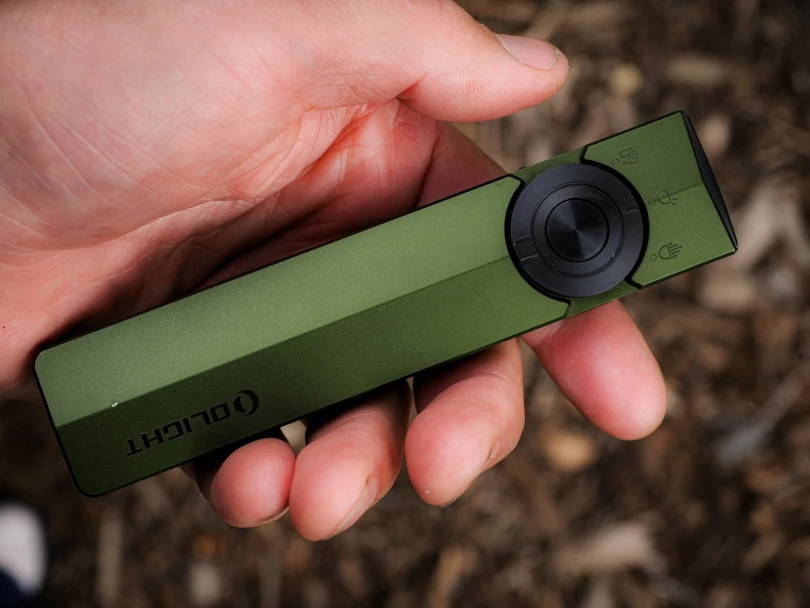 Olite ArkPro flashlight in hand