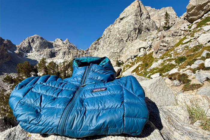 jacket laid on rocks in the alpine