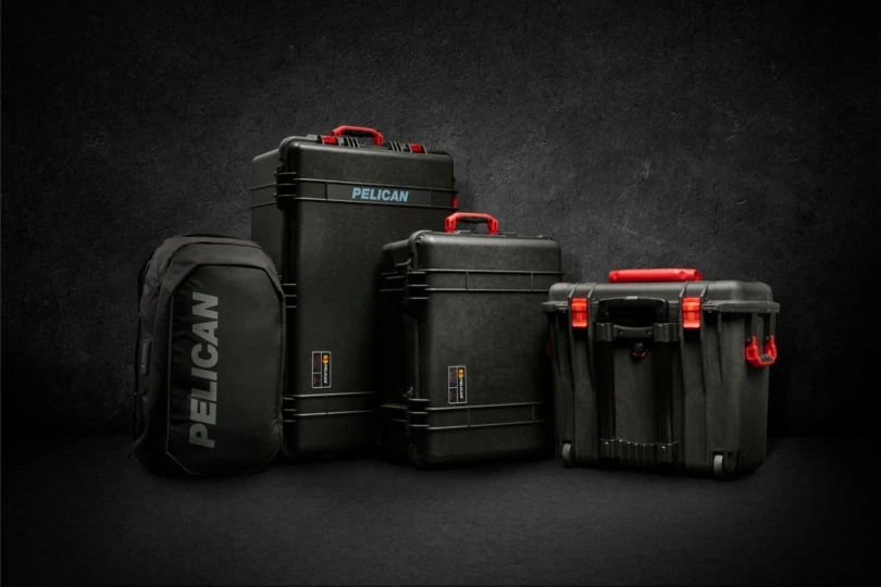 four black cases against black background