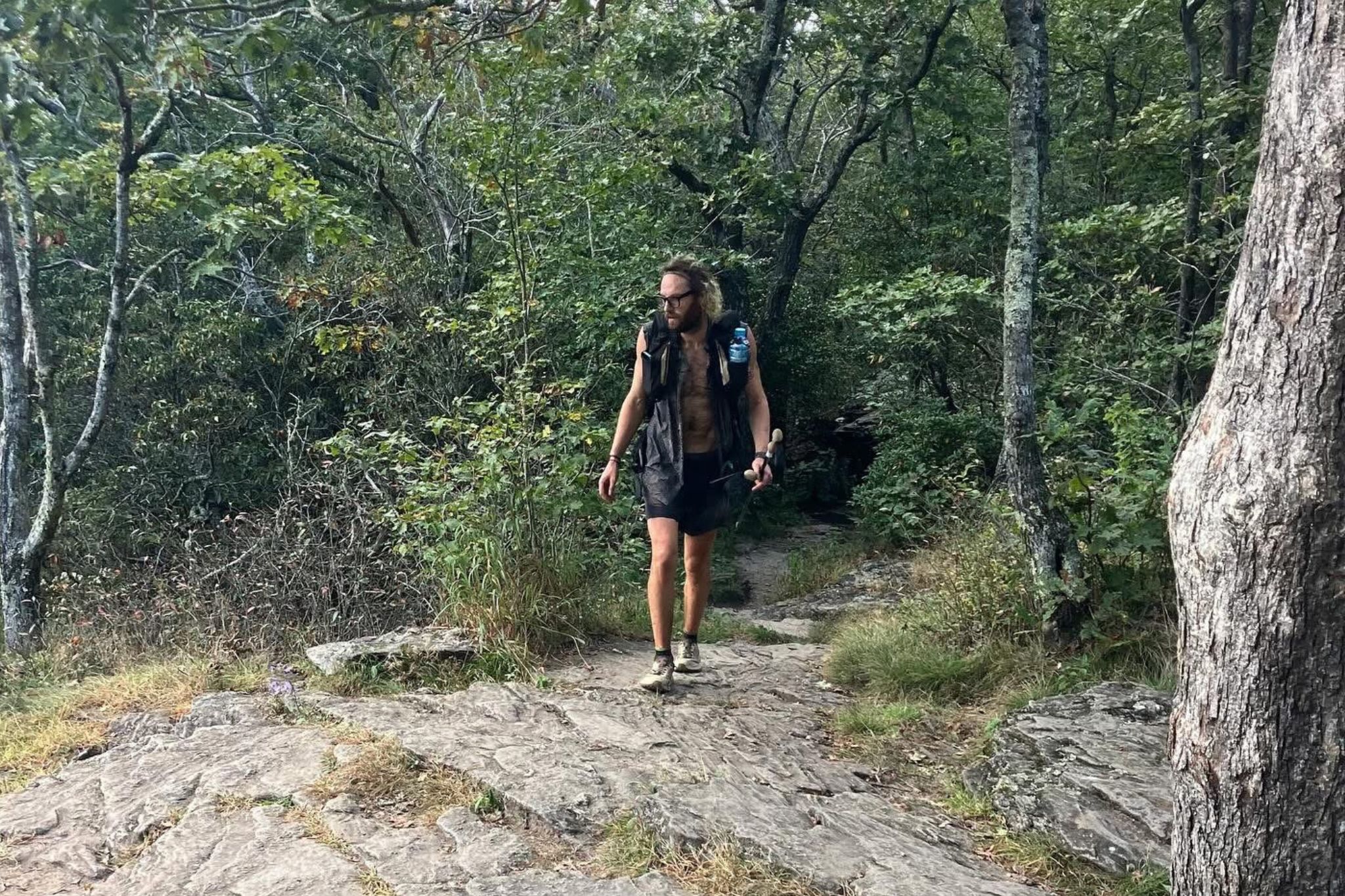Person hikes on trail