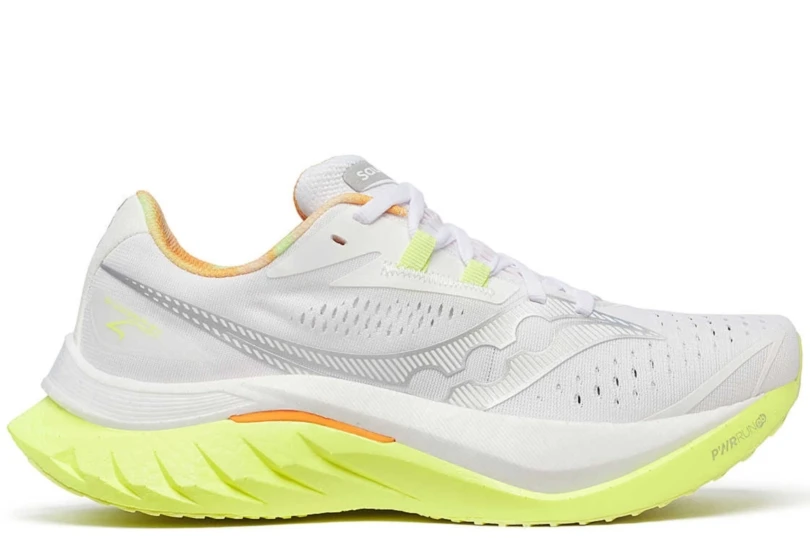 white and neon yellow running shoe