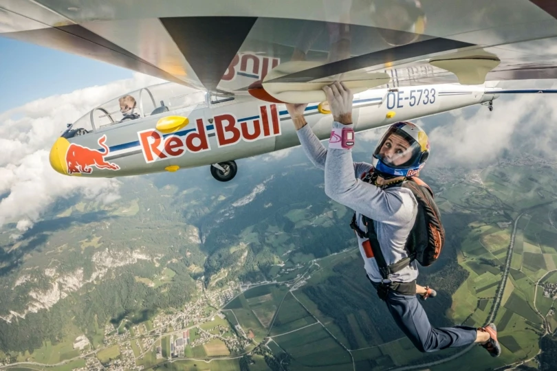 up close shot of person climbing on plane