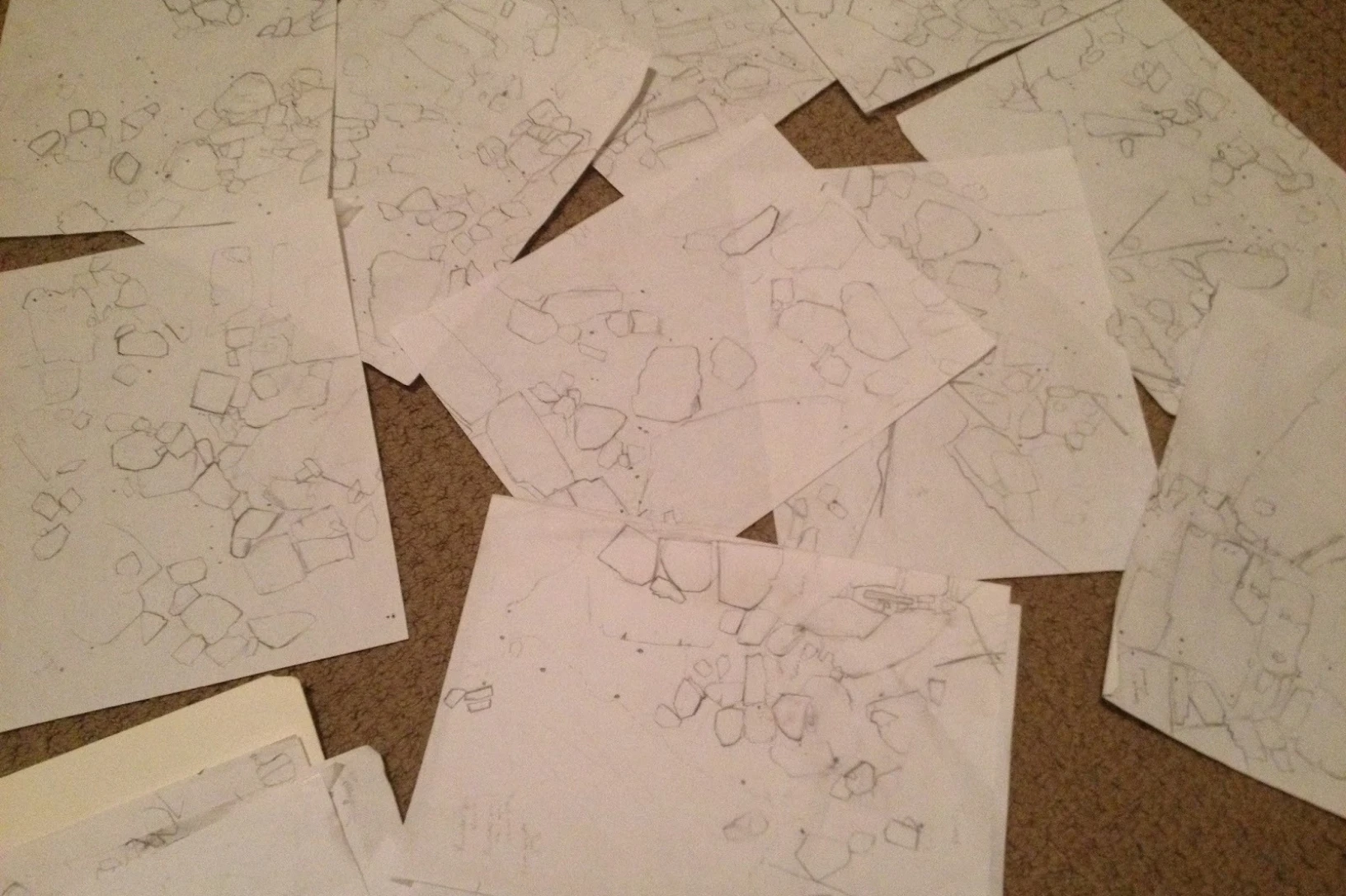 series of maps on white paper